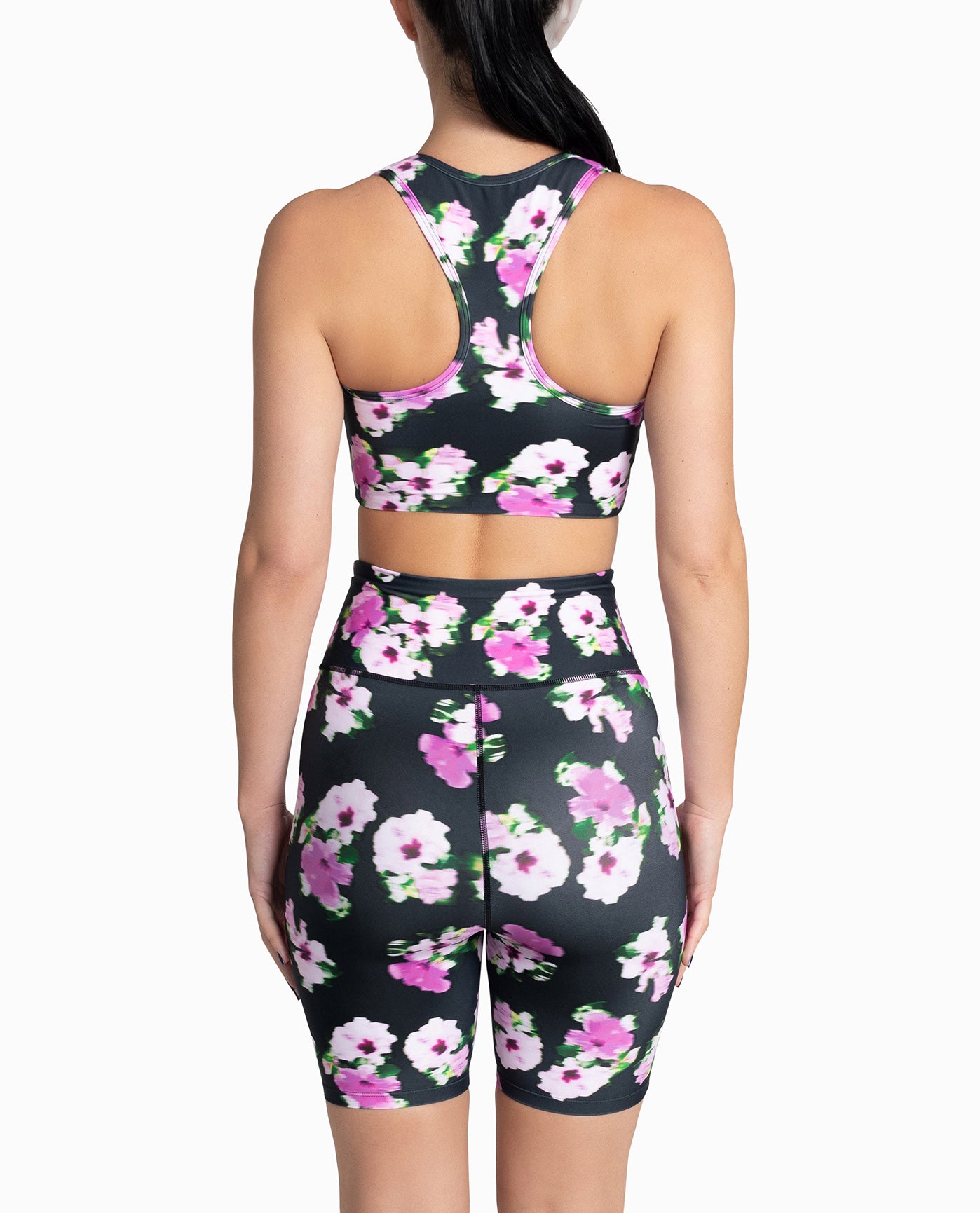 BACK OF CUT OUT RACERBACK SPORTS BRA | Pink and Black Floral