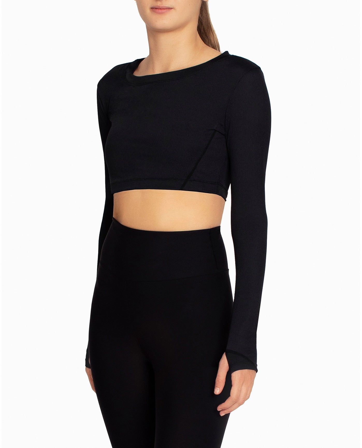 SIDE OF CROPPED ACTIVE LONG SLEEVE TOP | JET BLACK